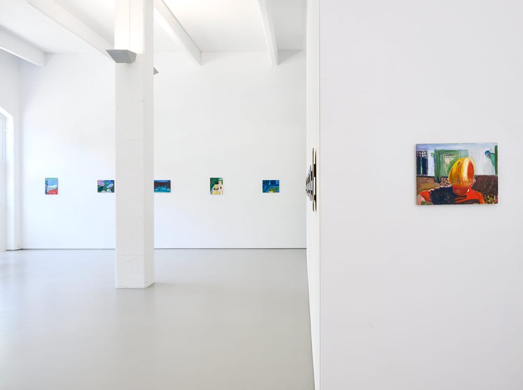 Contemporary art gallery installation in Galerie Onrust in 2022, showing vibrant paintings by Axel Linderholm on white walls. Featuring a colourful painting of a boy playing.