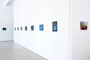 Contemporary art gallery installation in Galerie Onrust during Amsterdam Art Week 2022, showing vibrant paintings by Axel Linderholm on white walls.